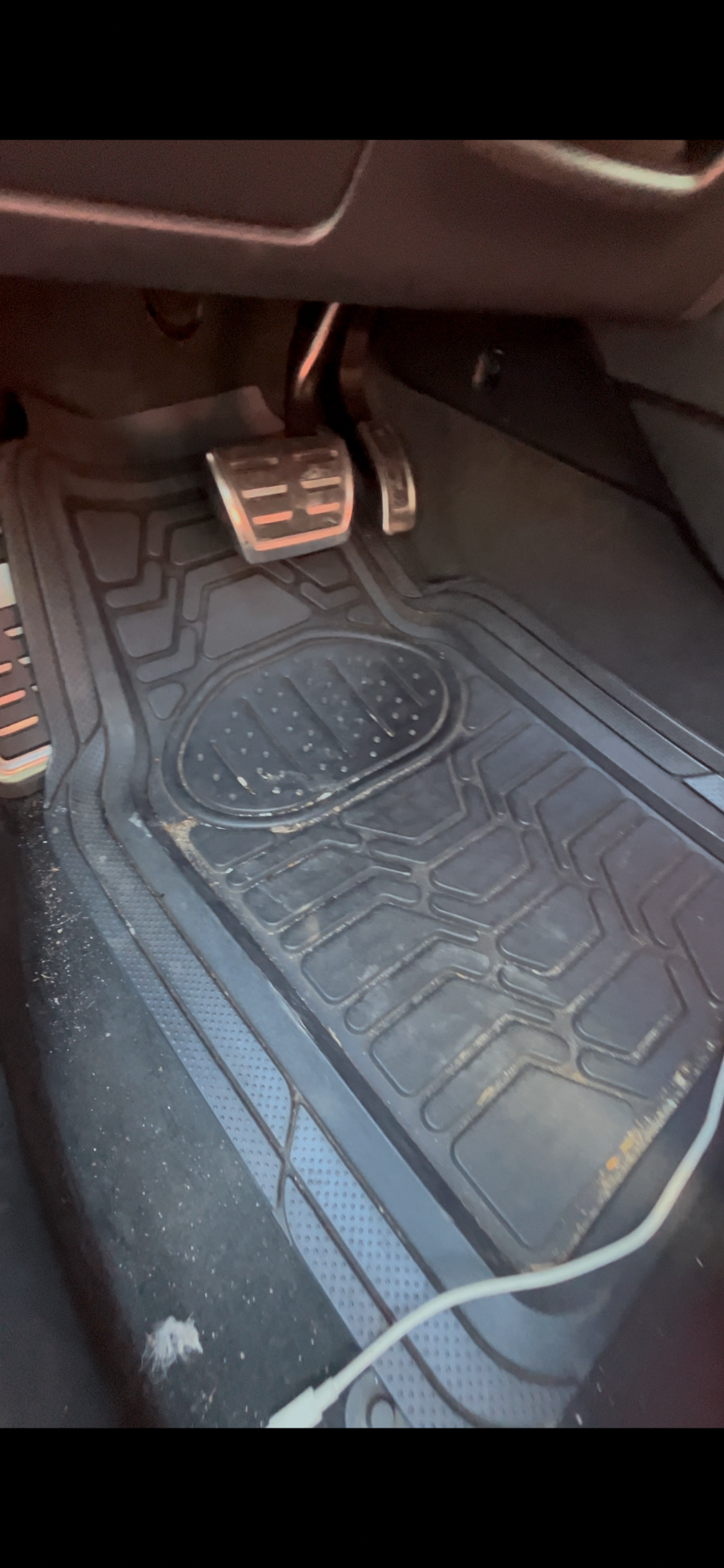 Floor mats & driver area — before