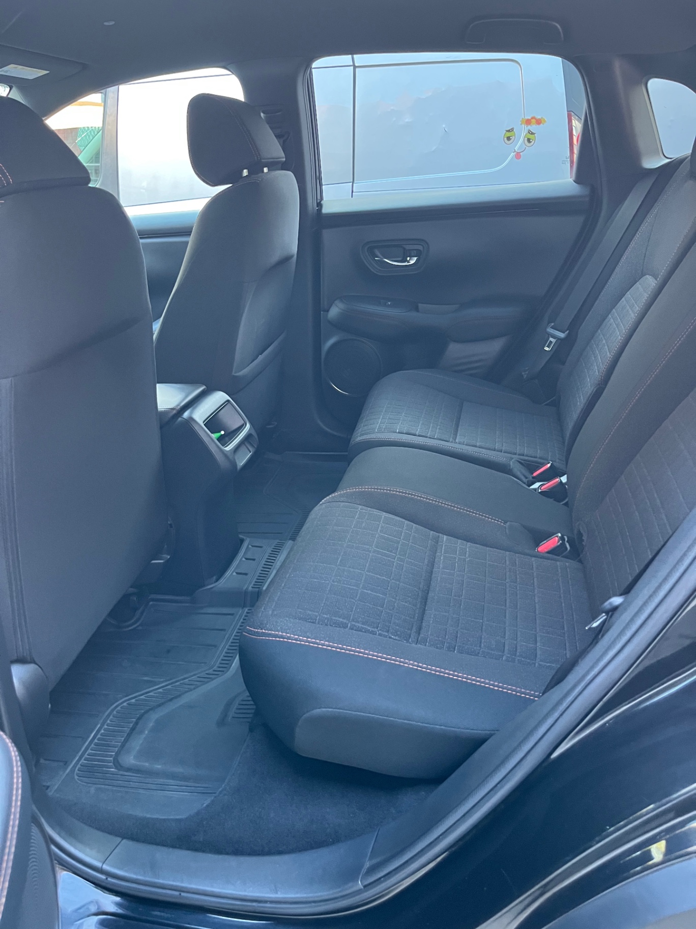 Rear seats & carpet — after